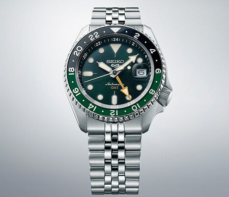 Seiko 5 Sports GMT automatic watch with green and black bezel, jubilee bracelet and 24-hour time display